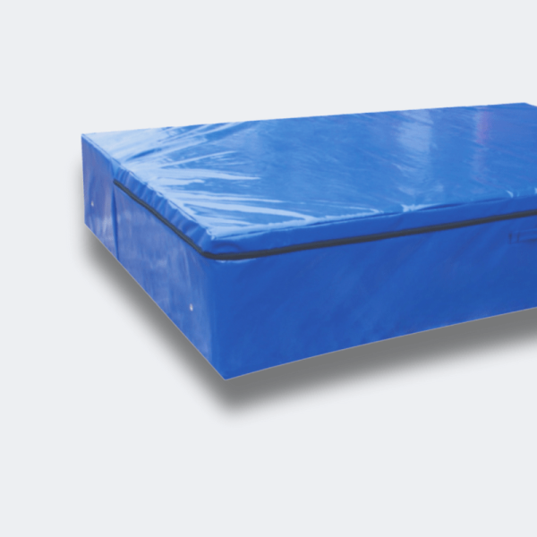 High Jump Landing Mat - Close-Up View Close-up of high jump landing mat, focusing on the ribbed foam and airtight PVC cover for durability